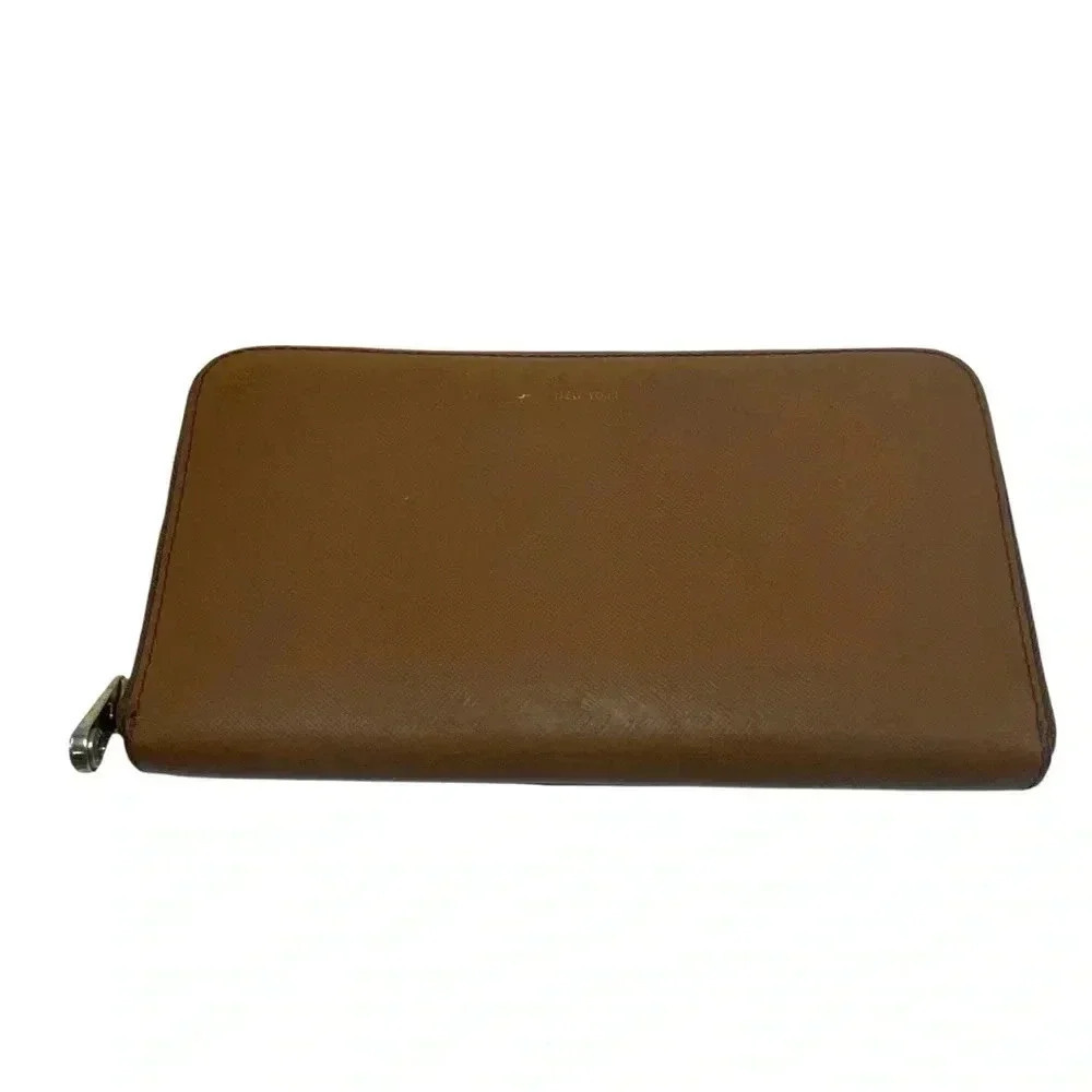 Henri Bendel tan leather zipper wallet